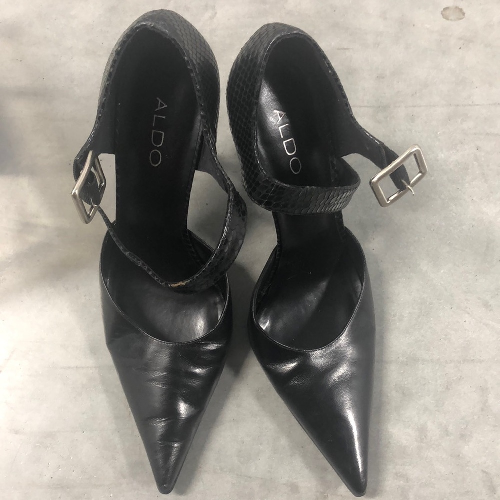 Black pointy toe pumps